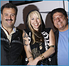 Pat and Lido posing with Suzie McNeil